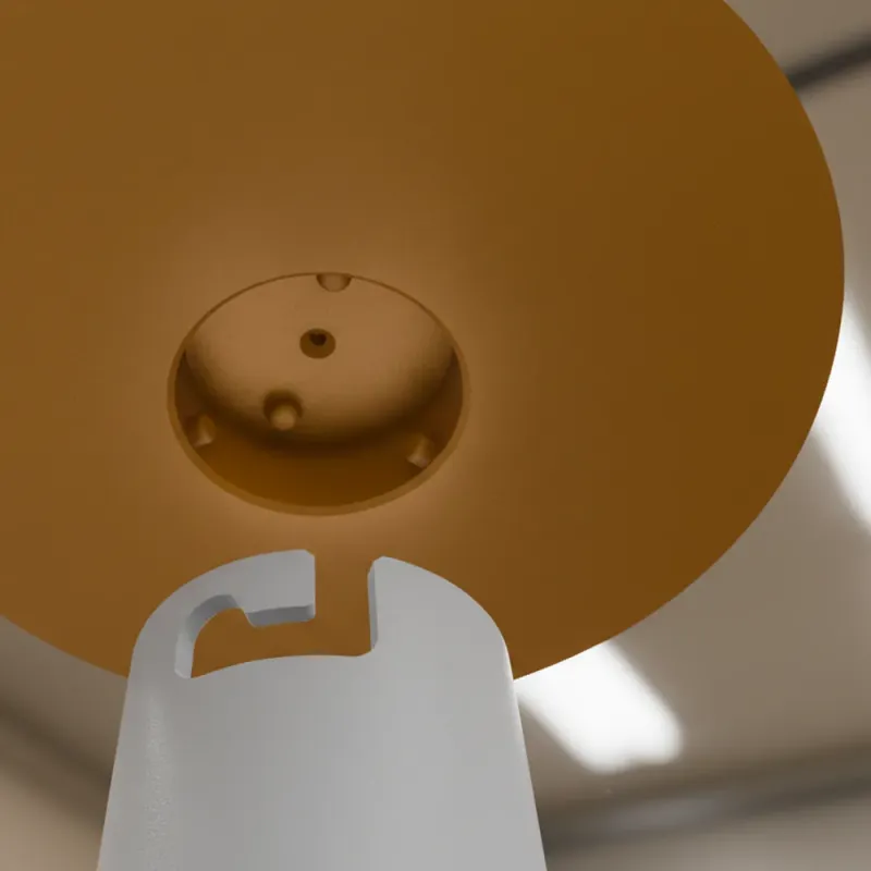 Detailansicht der Bajonettverbindung der BirdieBistro Futtersäule: orangener Deckel mit Rastnocken und graue Aufnahme mit Hakenmechanik