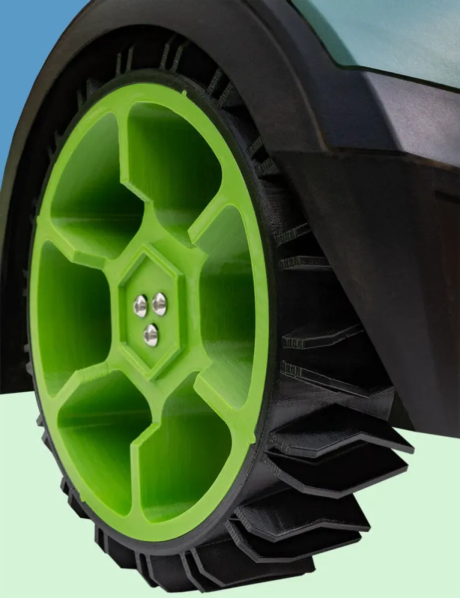 anyprint3d Offroad-Antriebsrad für Bosch Indego – Grüne Felge, passend zur Gartenumgebung.