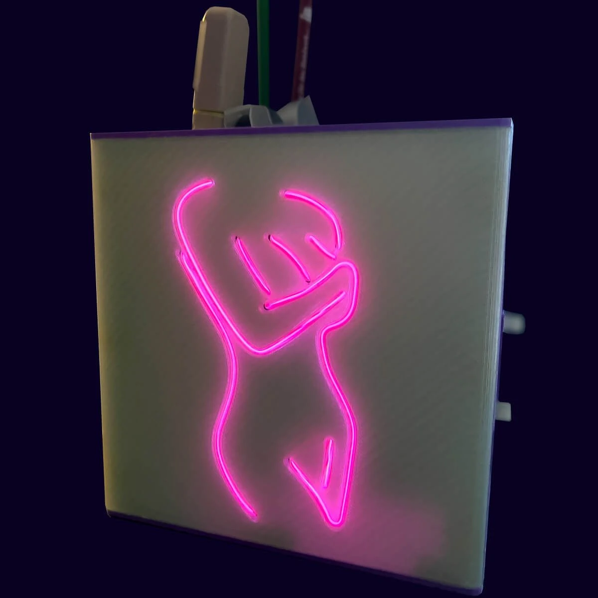 Desk organizer with neon LED motif